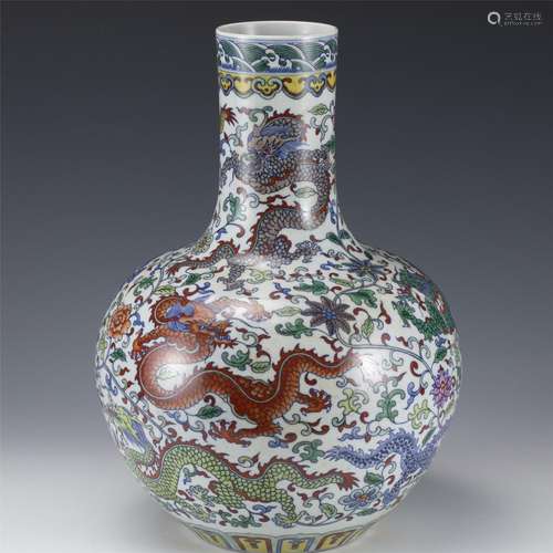 A CHINESE DOUCAI GLAZE DRAGON GLOBULAR VASE