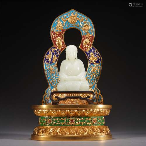 A CARVED JADE  FIGURE OF SHAKYAMUNI