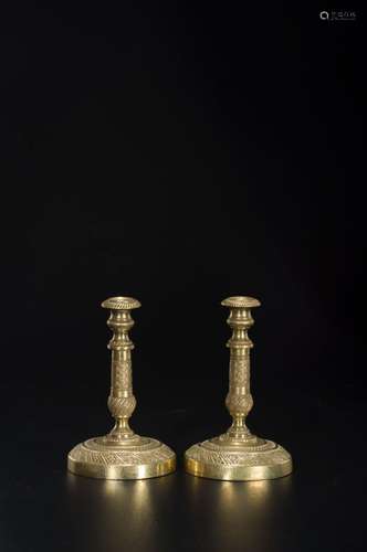 A PAIR OF COPPER CANDLESTICKS