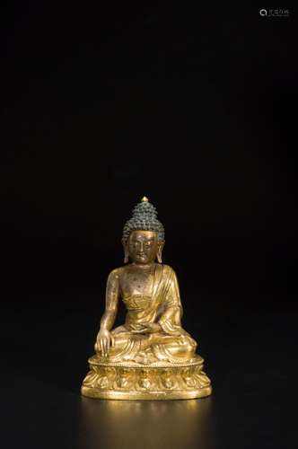 A GILT-COPPER SHAKYAMUNI BUDDHA STATUE