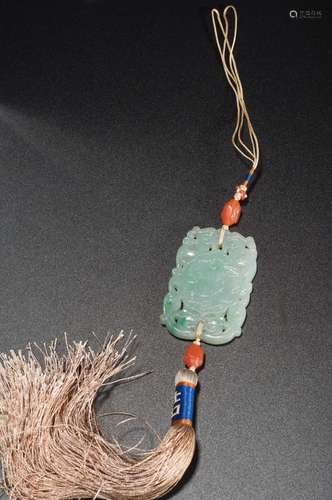 A JADEITE CARVED GOURD PENDANT