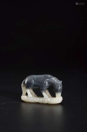 A BLACK AND WHITE JADE HORSE