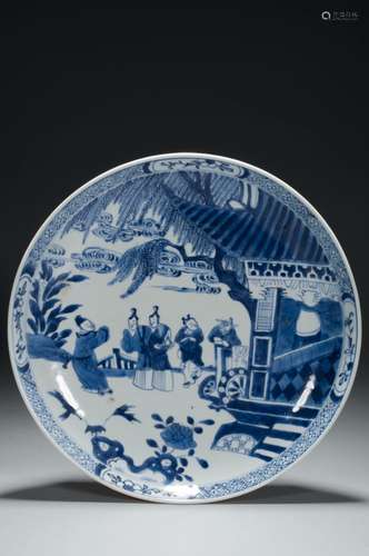 A BLUE AND WHITE FIGURE DISH