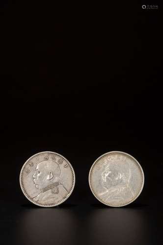 A SET OF 2 CHINESE SILVER COINS