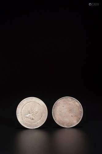 A SET OF 2 CHINESE SILVER COINS