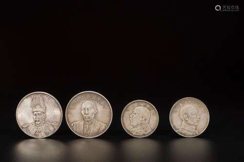 A SET OF 4 CHINESE SILVER COINS