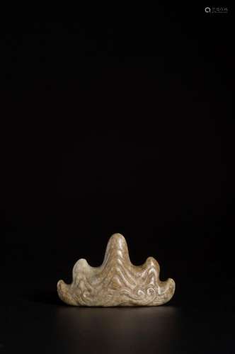 A GREENISH-GREY JADE BRUSH STAND