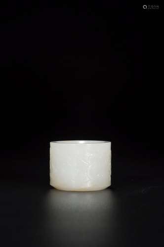 A WHITE JADE CARVED DRAGON RING