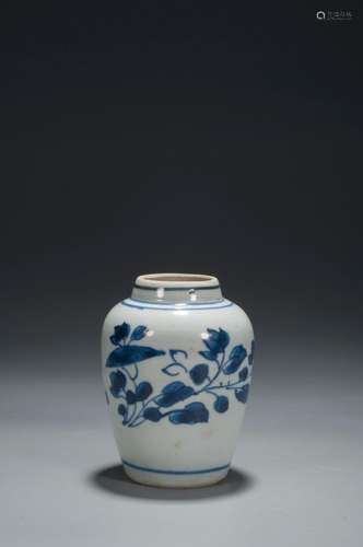 A BLUE AND WHITE STONE ANF FLOWER PATTERNED JAR