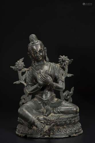 A COPPER GREEN TARA STATUE