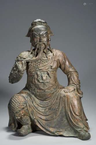 A COPPER STATUE OF GUANYU