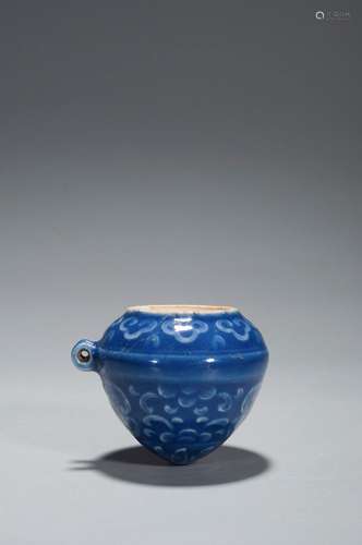 A BLUE GLAZE BIRD FOOD JAR