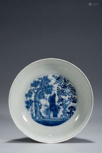 A BLUE AND WHITE DISH