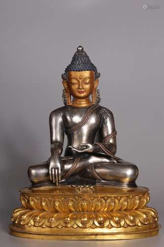 Silver, gold Buddha statue34 cm tall, 27 cm long and 20 cm w...