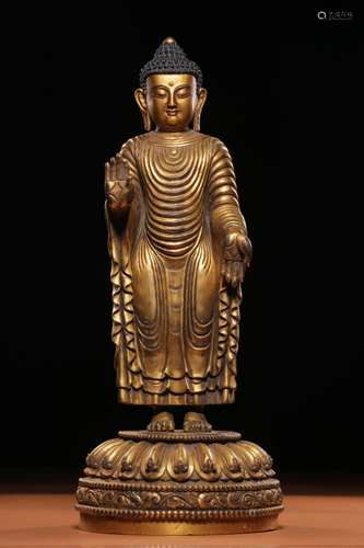 , copper Buddha stands resemble32 cm high, 12.7 cm in diamet...