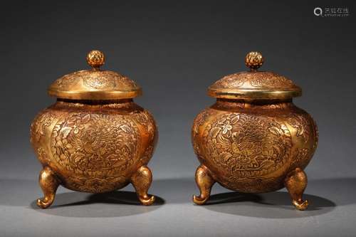 Copper and gold phoenix grain cover tank of a coupleSize: a ...