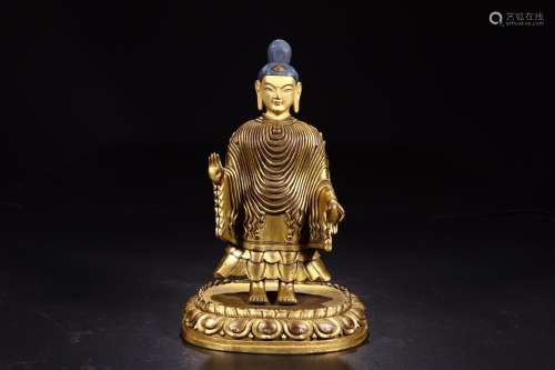 W number 4265: copper and gold swat stands resemble sakyamun...
