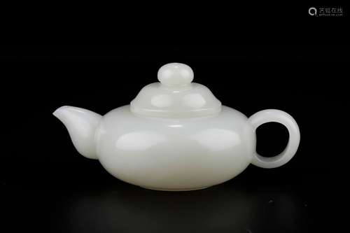 Hetian jade teapotSize: 7 14 cm wide: 251 gramsElaborately d...