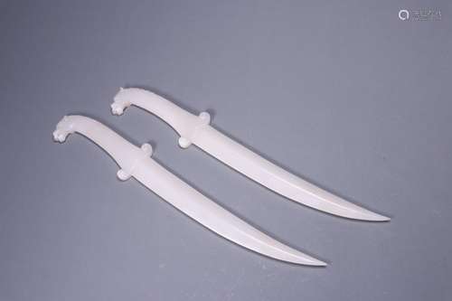 : hetian jade horse dagger of a coupleSize: 35.8 cm wide and...