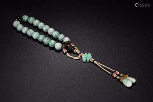 : jade handSize: bead diameter 1.3 cm weighs 116 gHolding co...