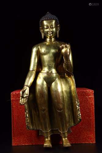 : copper and gold Buddha stands resembleSize: 13 cm long and...