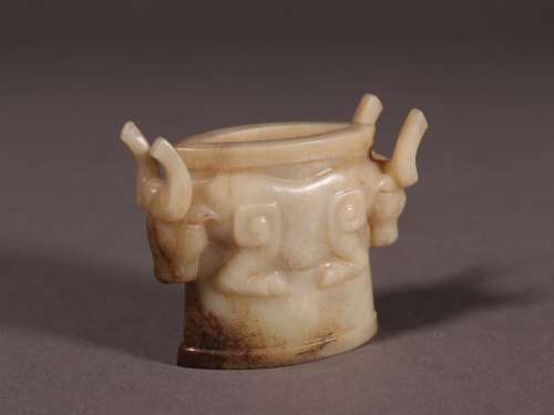 : ancient jade cow in the first caseSize: 4.2 cm wide and 5....
