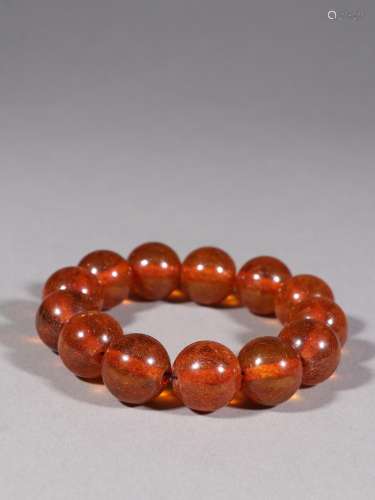 Amber round pearl hand string.Specification: bead diameter 2...