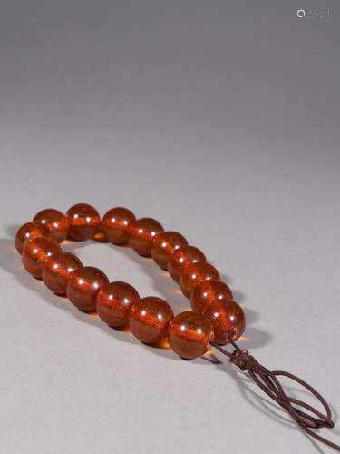 Amber round pearl handheld.Specification: bead diameter 2 cm...