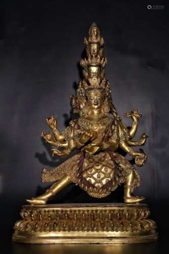 - copper and gold "eight arm ten side Buddha" stat...