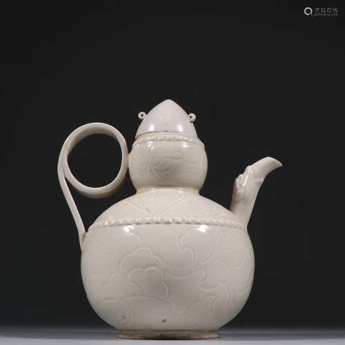 Ding kiln porcelain ewer.Size: 18.5 cm ear from 18 cm high.F...