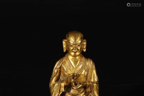 T's statue: copper and gold11 cm long, 7.5 cm wide, 14.5...