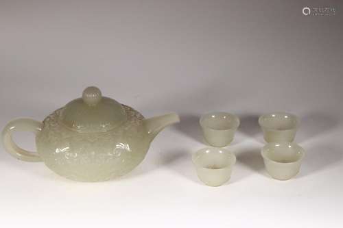 Hetian jade, a pot of four cupsSize 2 x3cm pot 7 x14cm cup