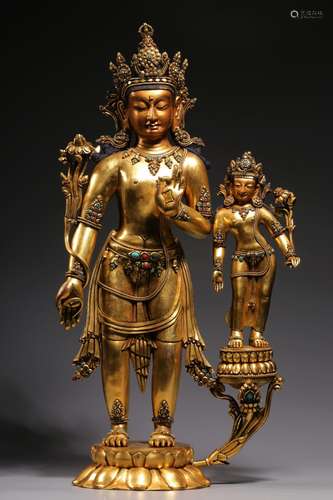 The gold, copper came hand double body Buddha stands resembl...