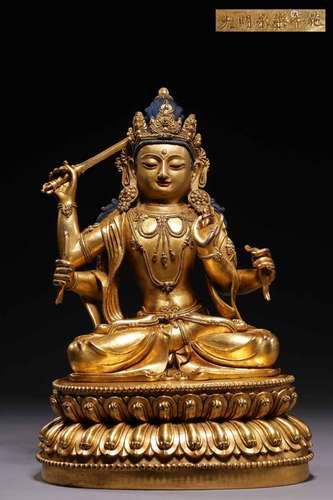 Four arms, "annual" copper and gold guanyin statue...