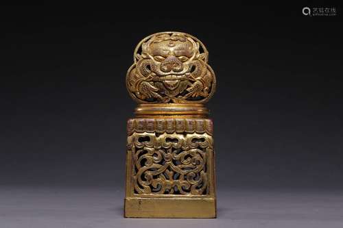 Stamp ofcopper and gold beast grain, 13 cm tall, bottom side...