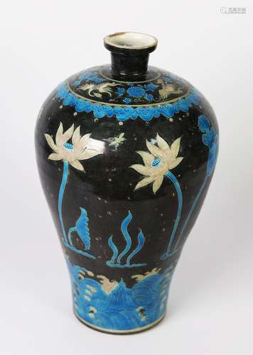 ORIENTAL LARGE POTTERY OVULAR VASE, surmounted by a small fl...