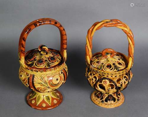 TWO SIMILAR TURKISH RED EARTHENWARE BASKET FORM COVERED STOR...