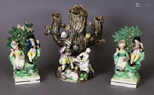 A PAIR OF STAFFORDSHIRE PEARLWARE BROCAGE GROUPS, c.1810, on...