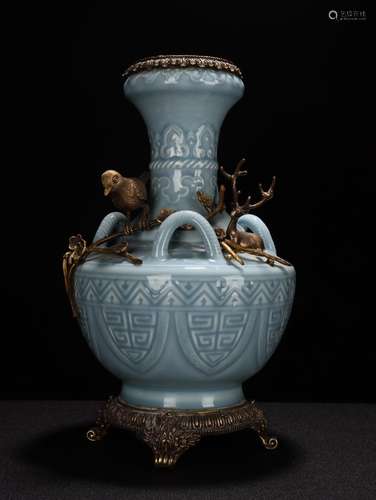 The bronze - sky blue glaze with painting of flowers and ble...