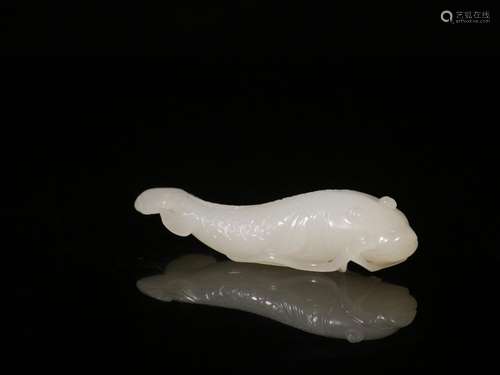 . The hetian jade manual sculpture fish hand pieceSize: 9 cm...