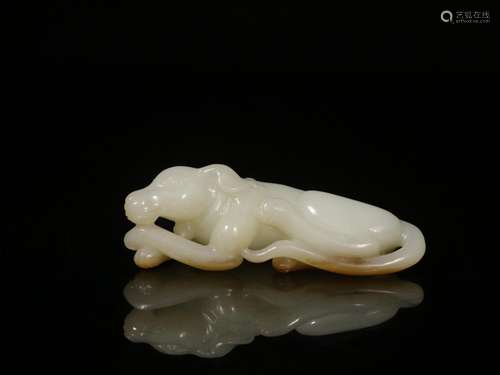 . Hotan white jade with a camel hand-carved lie dog thing in...