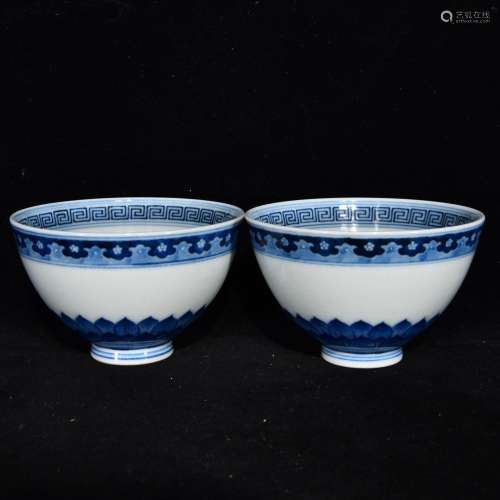 Blue and white flowers green-splashed bowls bound branches, ...