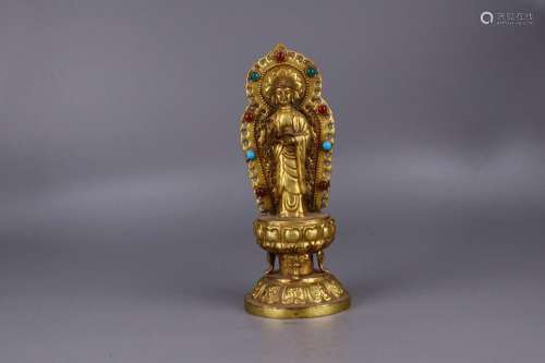 : copper and gold Buddha stands resemble23 cm long and 9.5 c...