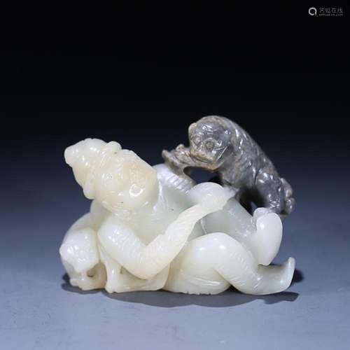 CHINESE HETIAN BLACK-AND-WHITE JADE FIGRUE OF BARBARIAN ON L...