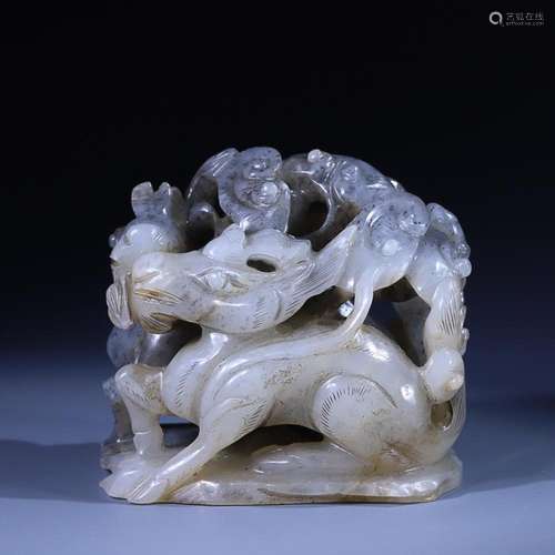 CHINESE HETIAN BLACK-AND-WHITE JADE KNOB WITH CARVED 'BE...