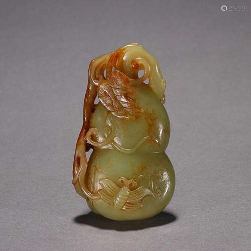 CHINESE HETIAN YELLOW JADE DOUBLE-GOURD WITH CARVED 'BUT...