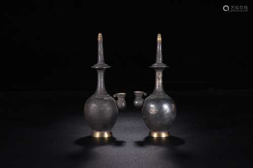 : a pair of silver net bottleSize: 12 cm wide 4.9 x 4.0 cm g...