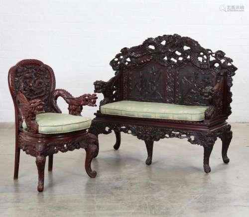 An Asian hardwood armchair and settee