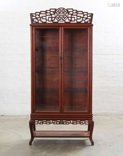 A Chinese hardwood vitrine cabinet