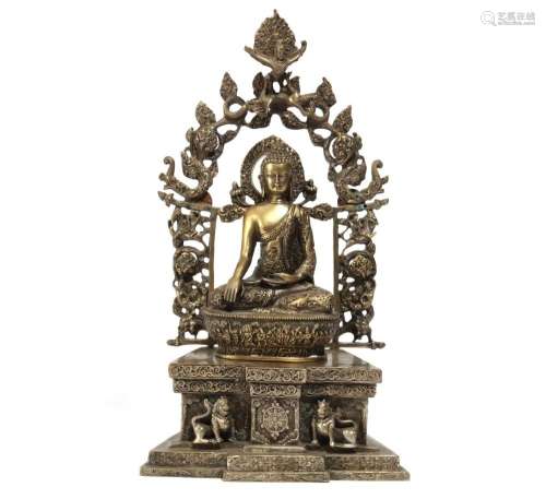 An Asian bronze seated deity